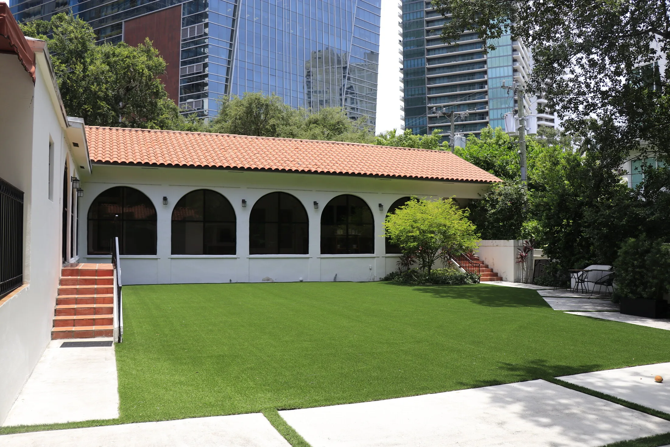 The Miami Skin Spa building — a restored Mediterranean home with arched colonnades in Brickell, Miami