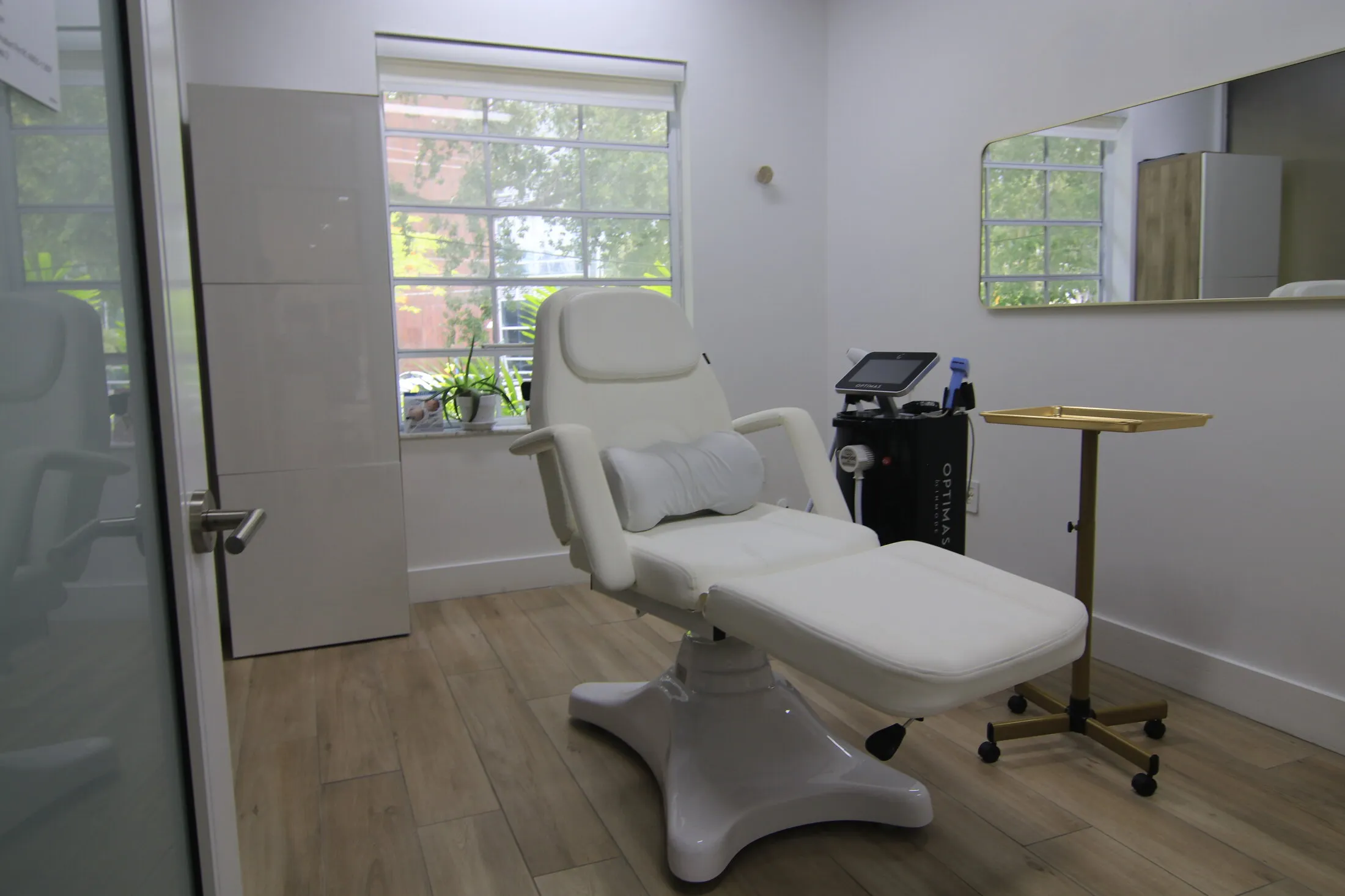 Laser treatment room with the Optimas platform at Miami Skin Spa in Brickell, Miami