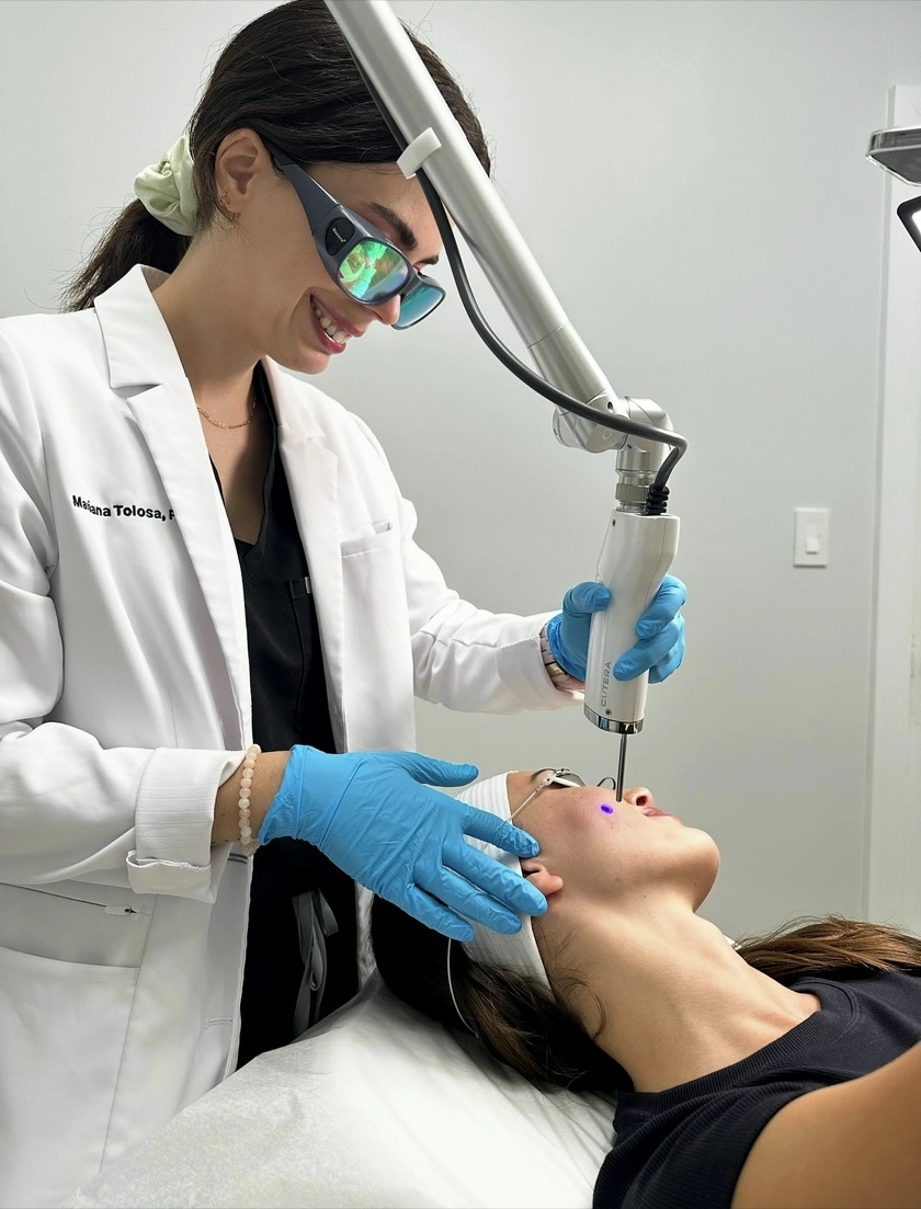 Mariana Tolosa, PA-C performing a laser skin treatment at Miami Skin Spa in Brickell